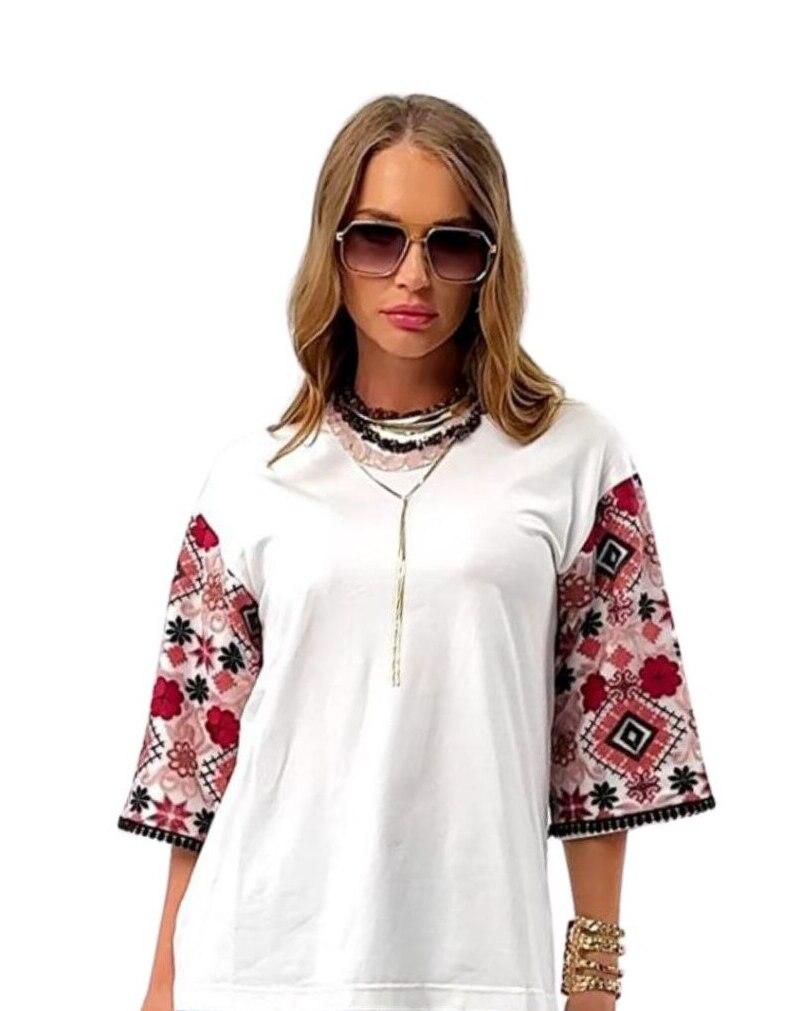 Cream T-shirt with embroidered sleeves in Ukrainian style