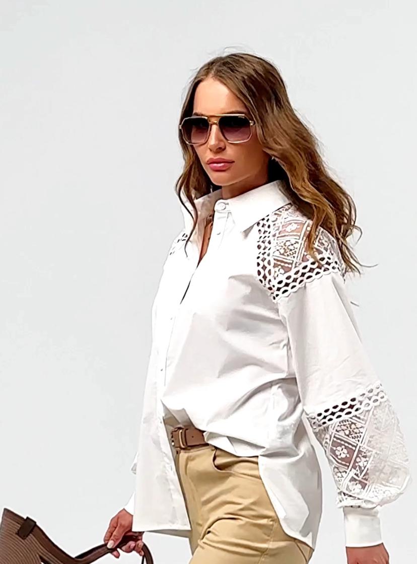 Elegant embroidered blouse with lace inserts