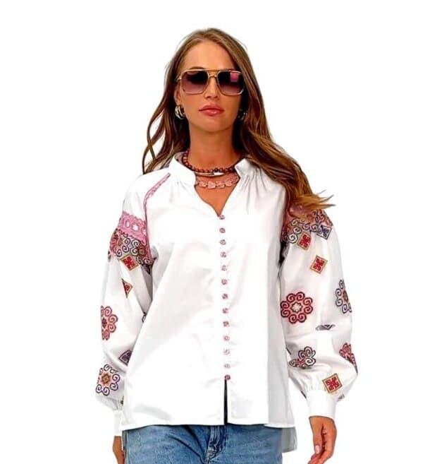  Vibrant embroidered blouse with pink lace
