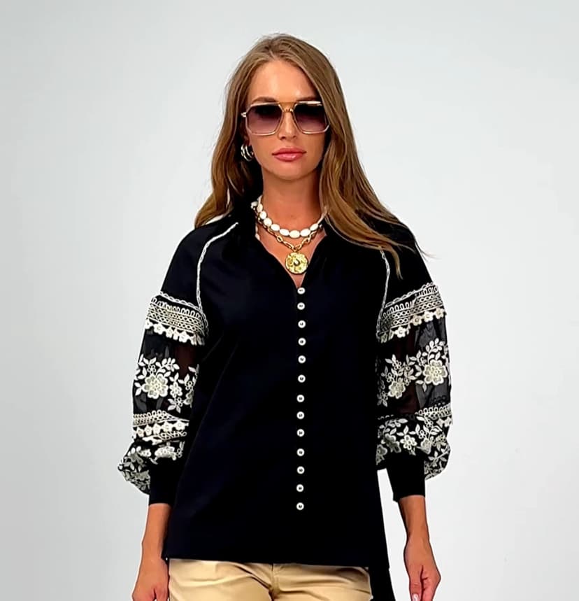 Elegant embroidered blouse with sleeve embroidery